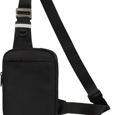Sleek black anti-theft cross body bag with a rectangular shape, adjustable strap, and secure zippered front pocket. Designed for travel security and convenience, it features minimalist styling and a compact design that sits close to the body.