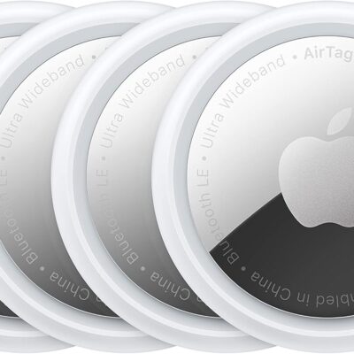 Four overlapping Apple AirTags with a sleek silver-and-white design, featuring the Apple logo in the center. These compact devices are often used as Air Tags luggage trackers to help travelers keep track of their bags